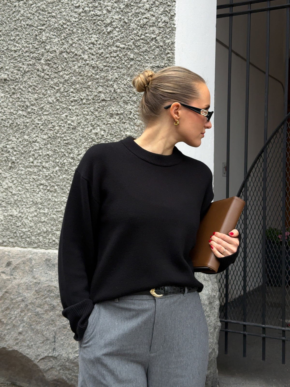 Chunky lambswool crewneck styled with grey tailored trousers for a timeless, everyday outfit.